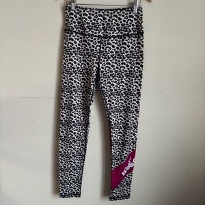 Kali women’s Black and White Patterned Leggings with Purple Accent